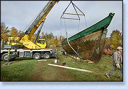 Being taken off the trailer by crane