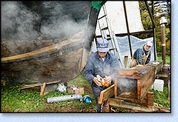 Shaving the plank before steaming