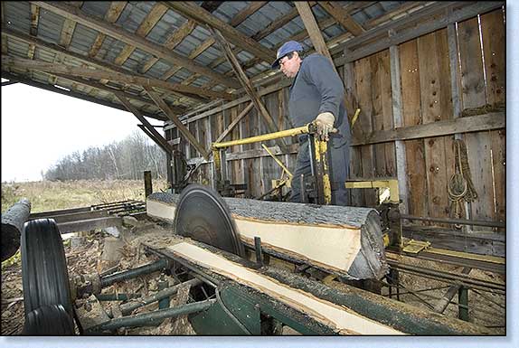 Vern Fairhead on the Mill with the Ash log.