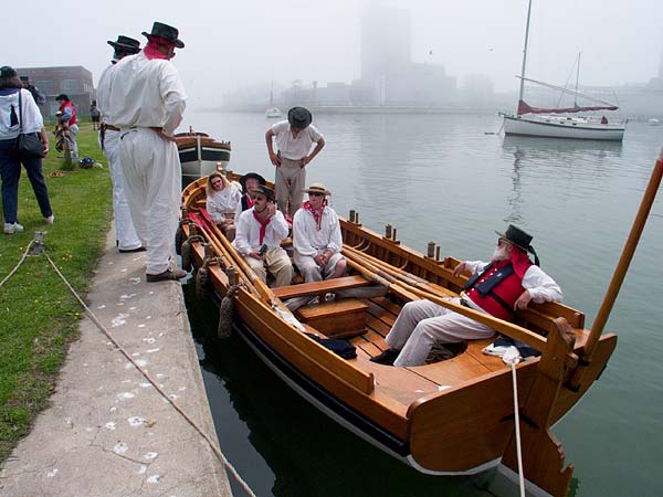 Crew relaxing in longboat