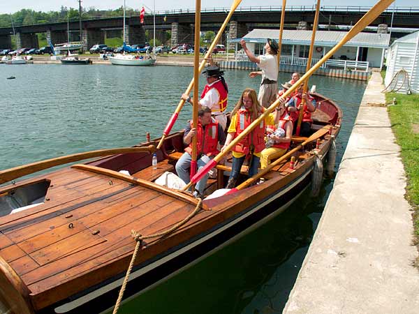 Crew relaxing in longboat