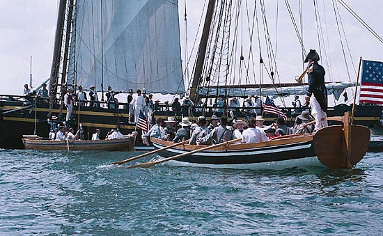 Tall ship and longboats