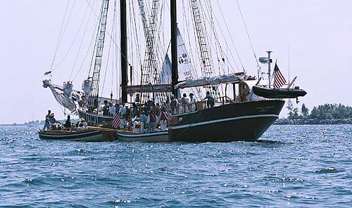 Tall ship and longboats