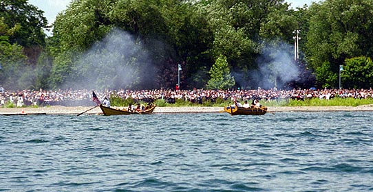 longboats and cannon smoke