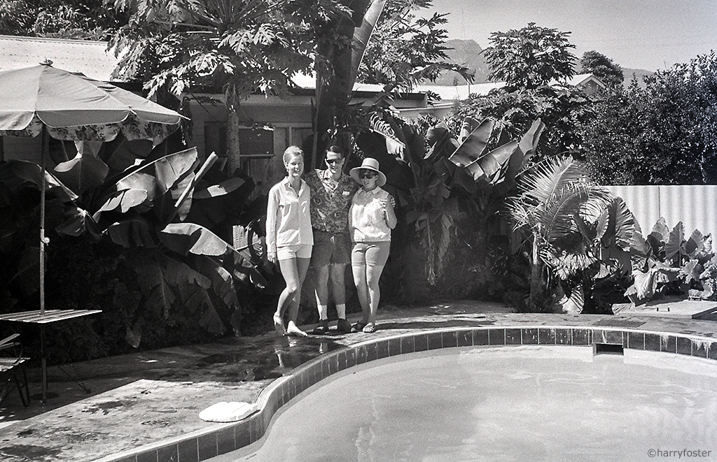 Paulene, Norman and Jodi posing by the pool.